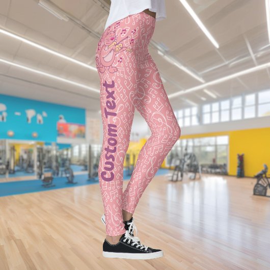 Chat rose avec leggings de violon
