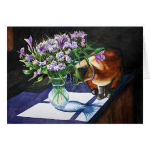 Chat siamois attaquant le vase des fleurs