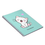 Chaton mignon génial sur un cahier sarcelle clair (Côté Droit)