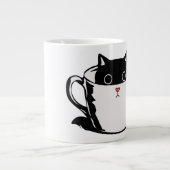 Chaton noir avec nez rouge caché dans une tasse (Devant)