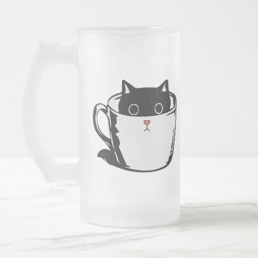 Chaton noir avec nez rouge caché dans une tasse (Gauche)