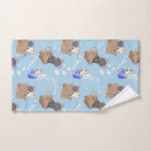 Chats en boîte et gouttes de lait sur bleu (Serviette à main)