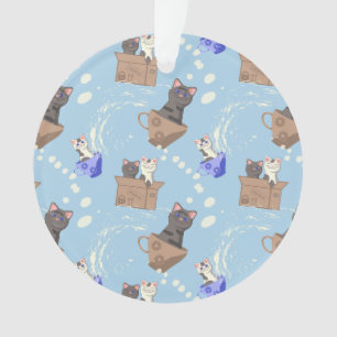 Chats en boîte et gouttes de lait sur bleu