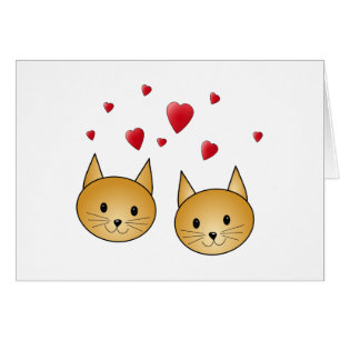Chats mignons de gingembre. Avec les coeurs rouges