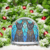 Chats noirs dans la conception artistique en verre (Noël)