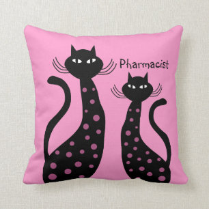 Chats noirs de coussin de pharmacien
