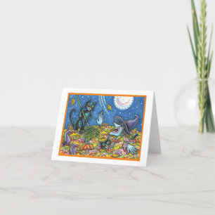 CHATS NOIRS ET TÉMOINS RAQUANT LA CARTE FEUILLE HA