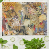 Chats une serviette de cuisine d'abondance (Plié)