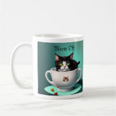 chatte mignonne dans une mignonne tasse pas mignon (Gauche)