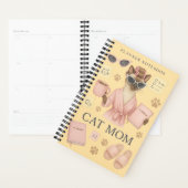 Chatte tenant un agenda quotidien (Devant avec enveloppe)