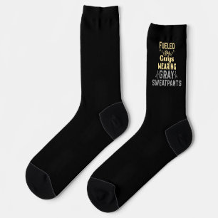 Chaussette Alimenté par des gars portant des sweatpants gris