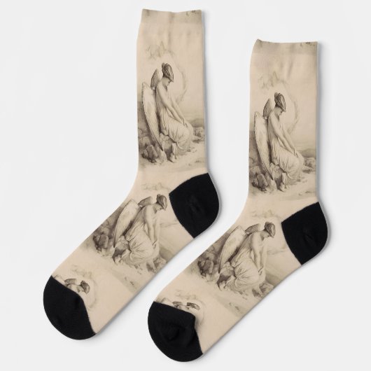 Chaussette Ange chrétien assis sur une pierre (Gauche)