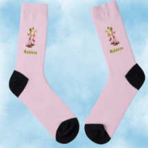 Grenouille en bottes roses mignonnes dans une flaq