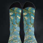 Chaussette Les amandes de Van Gogh fleurissent l'impressionni<br><div class="desc">"Almond Blossom" est l'une des oeuvres les plus emblématiques et vibrantes de Vincent van Gogh, créée en 1890. Le tableau présente une représentation délicate et fraîche de branches d'amande fleurissantes, dressées contre un ciel bleu clair. Les coups de pinceau de Van Gogh sont amples mais expressifs, captant l’énergie et la...</div>