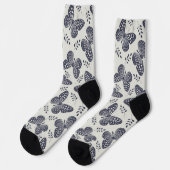 Chaussette Motif papillon bleu foncé sur arrière - plan gris (Gauche)