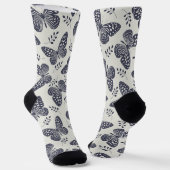 Chaussette Motif papillon bleu foncé sur arrière - plan gris (Angulaire)