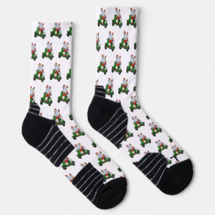 Chaussette Père Noël et Mme Claus chevauchant un scooter