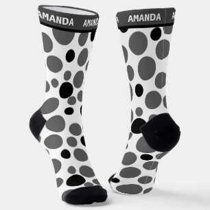 Chaussette pois noir rouge rétro sur arrière - plan blanc