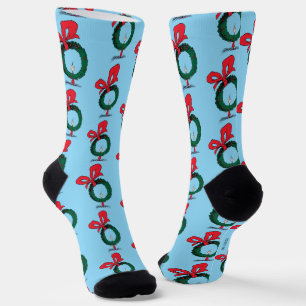 Chaussette Qui regarde à travers la couronne de Noël