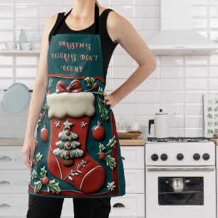 Chaussette rouge sur tablier de Noël vert