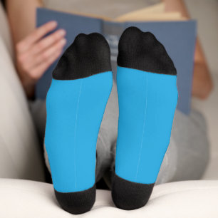 Chaussette un arrière - plan bleu avec un