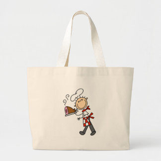 Chef avec les sacs cuits au four de jambon