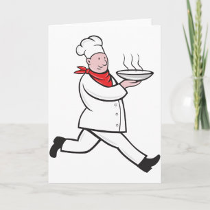 Chef portant des cartes de voeux alimentaires