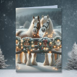 Chevaux de fête et lumières de Noël<br><div class="desc">Carte de Noël. Deux chevaux,  un cheval brun et un cheval blanc debout derrière une clôture éclairée par des lumières de Noël et des couronnes un jour enneigé.</div>