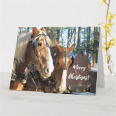 Chevaux d'hiver sur la carte de Noël du village de (Fleur jaune)