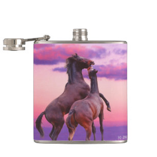 Chevaux jouant le flacon de lever de soleil