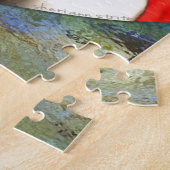 Chèvre avec le puzzle de coeur (Côté)