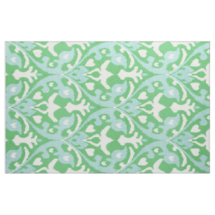 Chic-groene en turquoise-ikattribale patronen stof