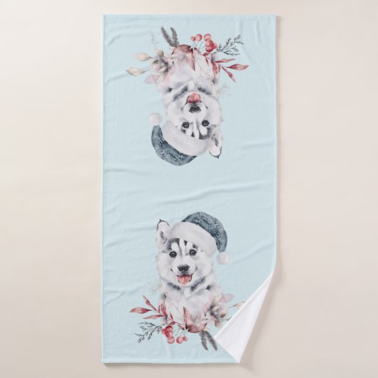 Chien de Noël Husky dans un chapeau de Père Noël (Serviette de bain)