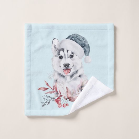 Chien de Noël Husky dans un chapeau de Père Noël (Gant de toilette)