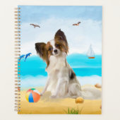 Chien de Papillon sur la plage (Devant)