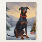 Chien Doberman dans la neige de Noël (Dos)