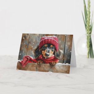 Chien mignon Dachshund dans la carte de Noël Casqu