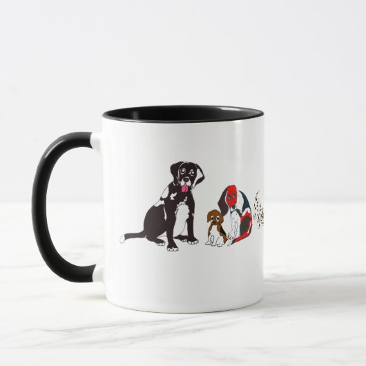 Chienchiens dans une tasse de rangée (Gauche)