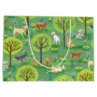 Chiens mignons dans le sac de cadeau de parc de