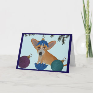 Chihuahua in gebroken kerstversiering kaart