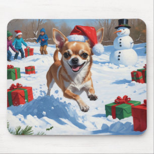 Chihuahua loopt in de sneeuw met kerstmuts muismat