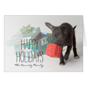 Chiot avec des cadeaux de Noël