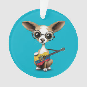 Chiot de chiwawa jouant la guitare de drapeau