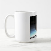 Chiot pomeranian de chocolat sur la tasse (Gauche)