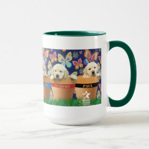 Chiots dans la tasse de pots de fleurs