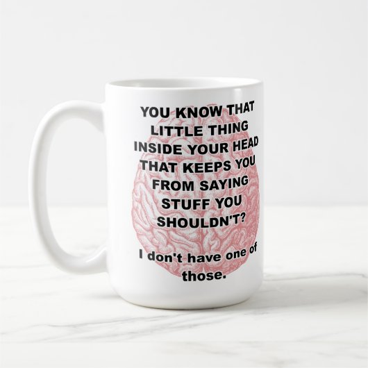 Chose à l'intérieur de la tasse (Gauche)