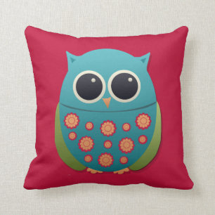 Chouette bleue et verte mignonne sur un oreiller r