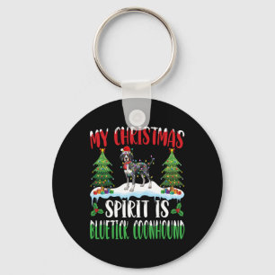 Christmas Spirit is een bluetick coonhound die een Sleutelhanger