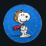 Cible De Fléchettes cacahuètes | Snoopy L'As Volant<br><div class="desc">Cette jolie conception Peanuts présente Snoopy comme la lecture d'as volant de la Première Guerre mondiale pour prendre sur le Baron Rouge de l'Allemagne.</div>