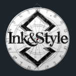 Cible De Fléchettes Ink&Style<br><div class="desc">¡Sé el primero en tenerlo! Presentamos la primera obra oficial de Ink&Style: un diseño único que combina elegancia, trazos artísticos y geometría con carácter. Esta pieza es más que un logo: es una declaración de estilo, creatividad e identidad visual. Ideal para cuadros decorativos, rompecabezas, bolsos, posters o cualquier objeto con...</div>